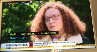 Hannah speaking on TV. The ribbon across the bottom says 'Complex Regional Pain Syndrome sufferer, Hannah Deakin'.