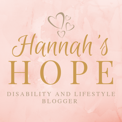 Hannah's Hope logo, new in 2021. It is a pale pink/ rose gold colour background. 'Hannah's Hope' is written in mustard/ gold. There are three hearts above the 'Hannah's Hope' in grey and below in small grey writing it says: 'Disability and Lifestyle blogger'.