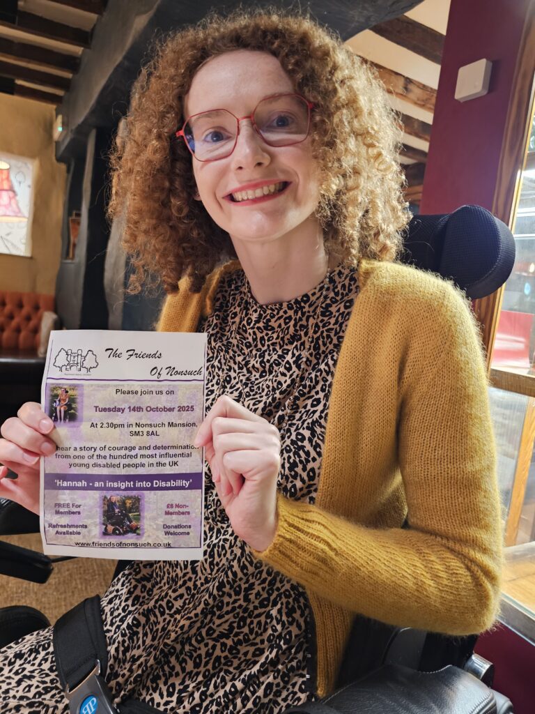 Hannah with a flyer about her speech