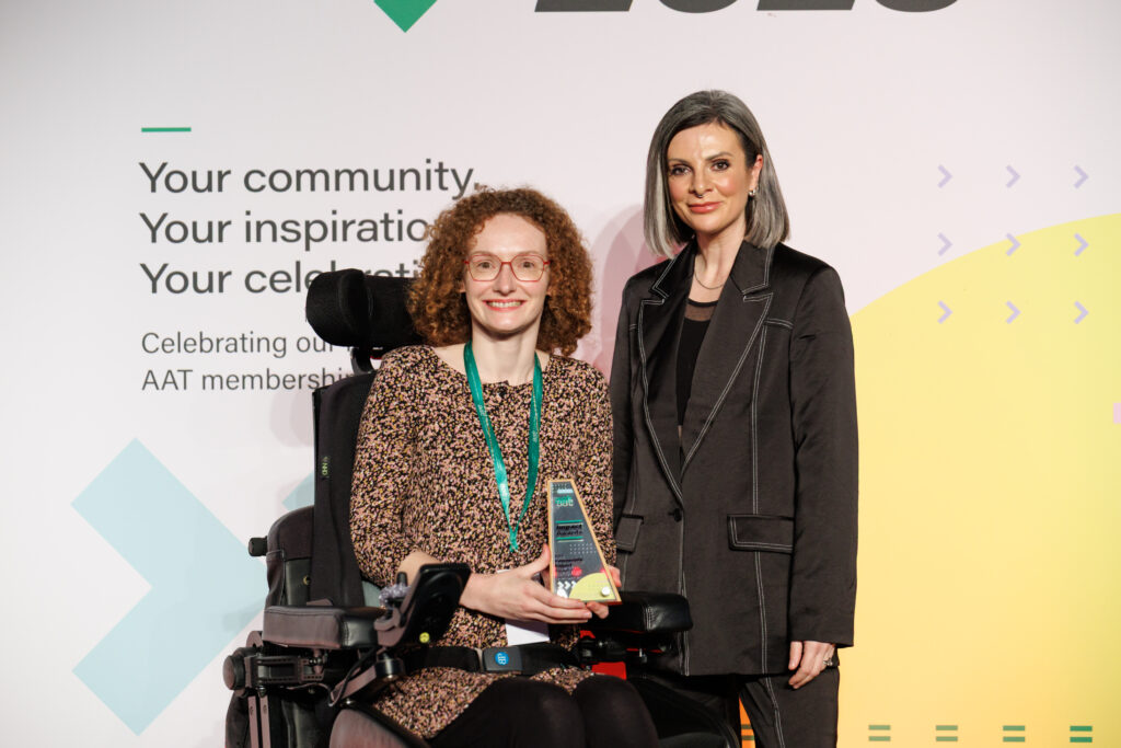 Hannah with the AAT President Lucy receiving her AAT community impact award. A 2025 highlight.